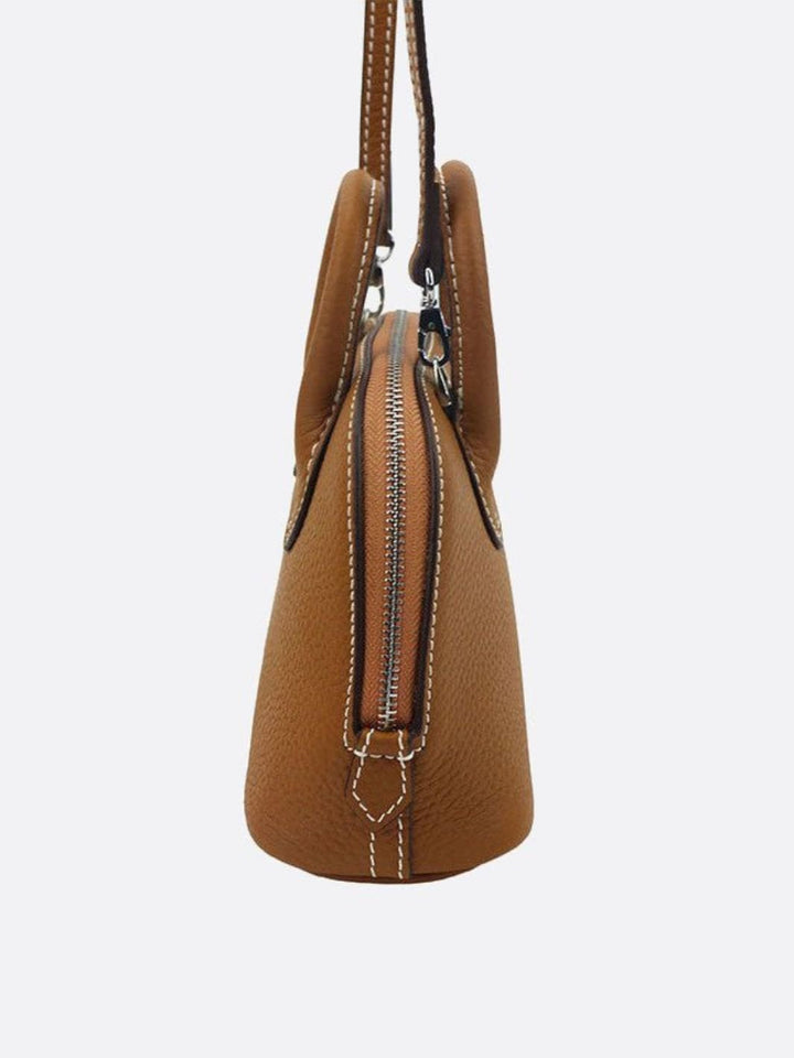 Small leather handbag with shoulder strap