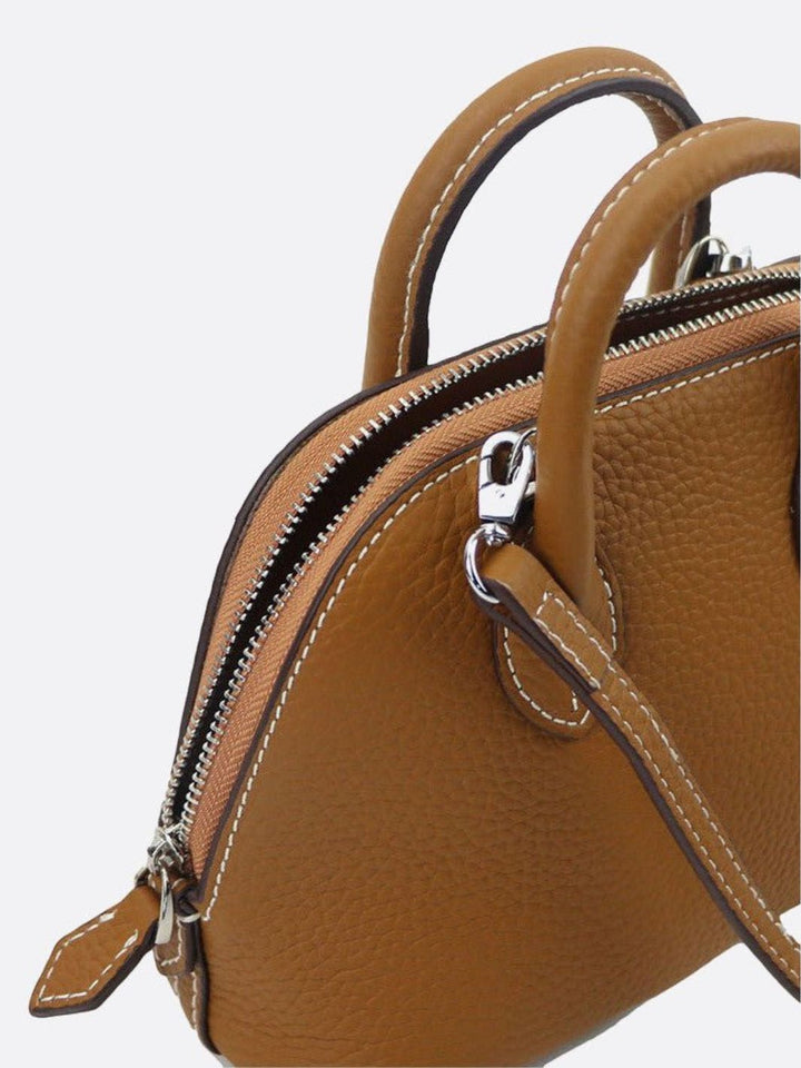 Small leather handbag with shoulder strap