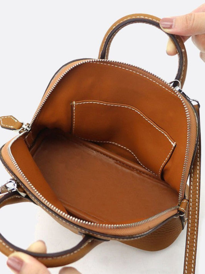 Small leather handbag with shoulder strap