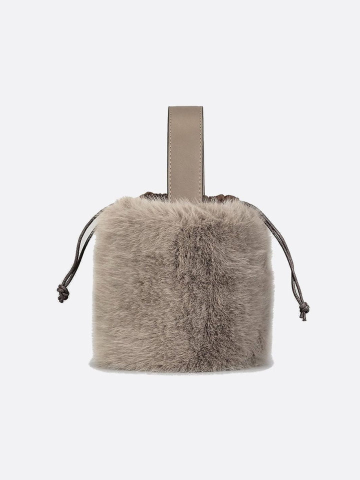 Sac à main avec fausse fourrure beige