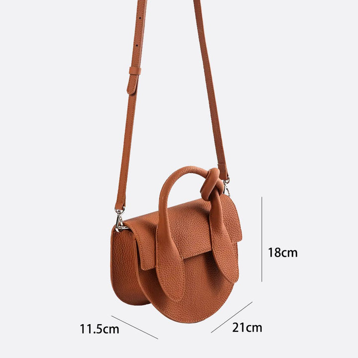 Half moon leather handbag