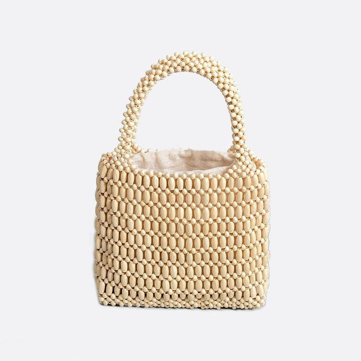 sac à main en perles de bois blanc