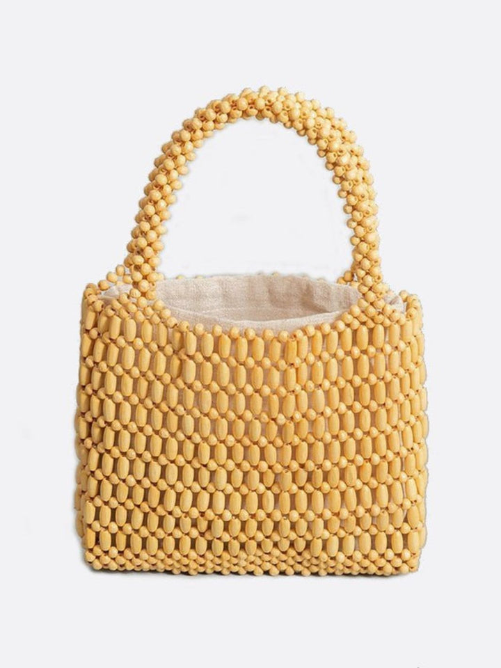 Sac à main en perles de bois jaune moutarde