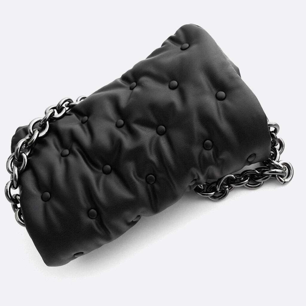 Black quilted bag with chain