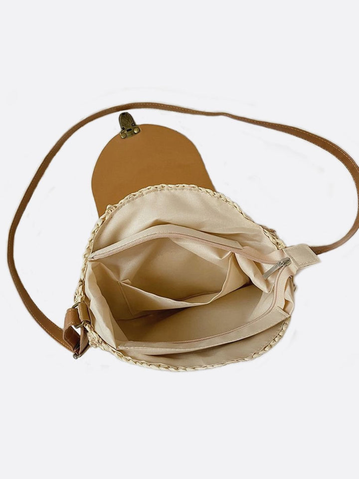 Round straw shoulder bag