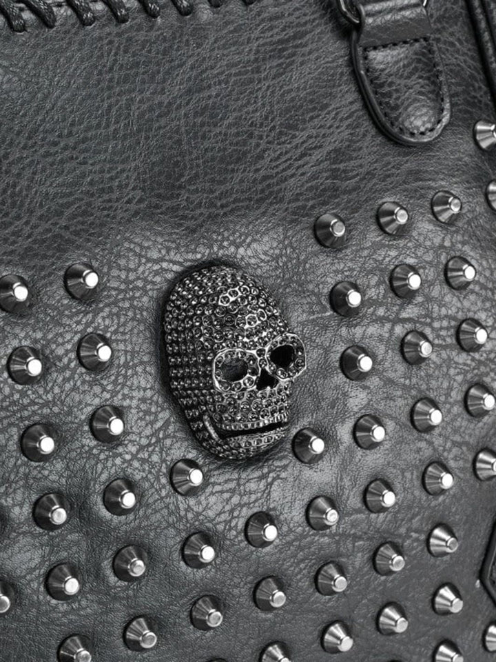 Black studded leather tote bag