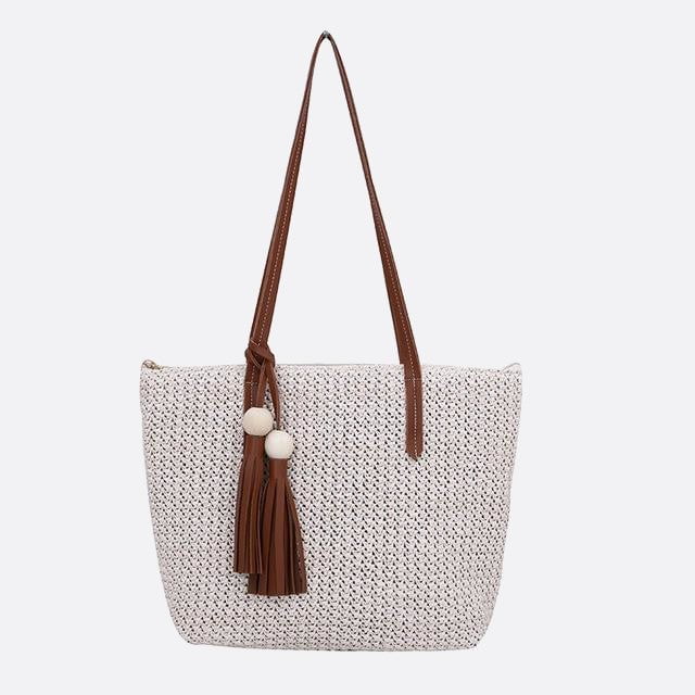 sac cabas paille avec pompon et anse cuir blanc