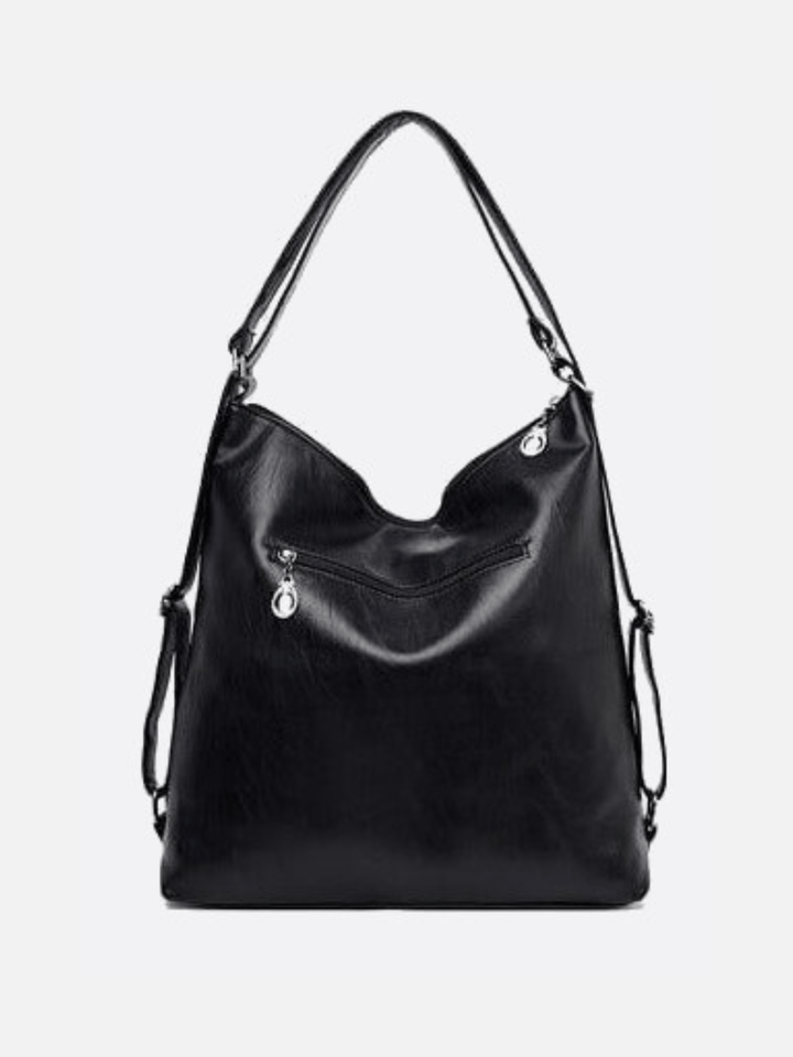 Leather shoulder bag convertible into a backpack