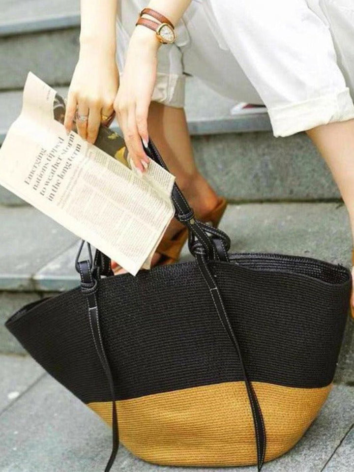 Straw bag with leather handle