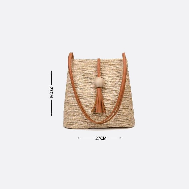 Straw bucket bag with pompom